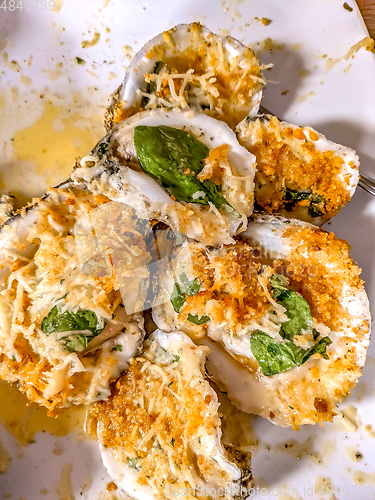 Image of Fried rockerfeller oyster shell with sauce