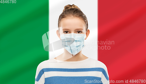 Image of teenage girl in medical mask over flag of italy