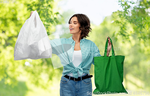 Image of woman with plastic and reusable shopping bag