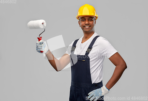 Image of happy indian painter or builder with paint roller