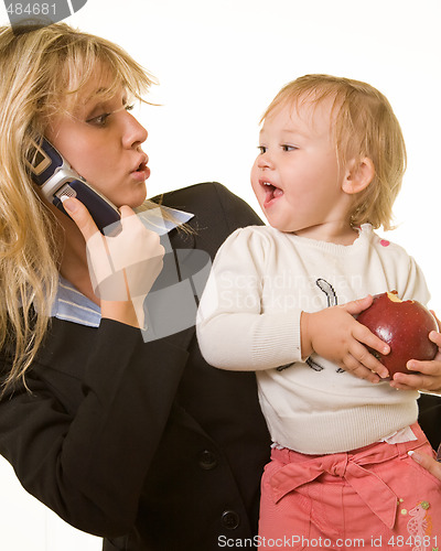 Image of Working mom with baby