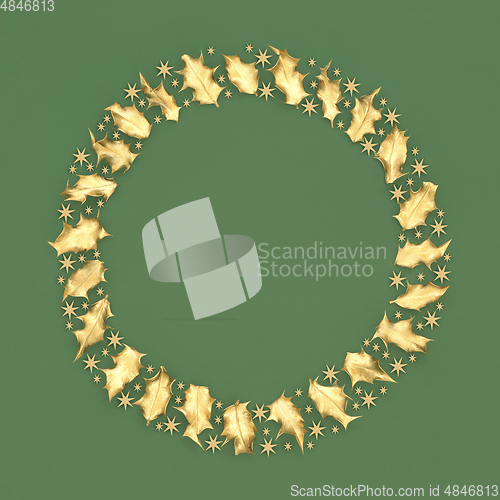 Image of Abstract Christmas Wreath of Gold Stars and Holly Leaves