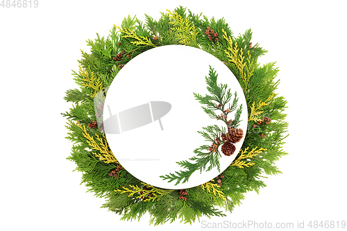 Image of Abstract Christmas Place Setting with Winter Greenery