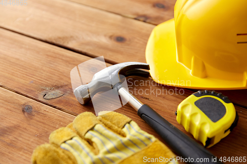 Image of different work tools on wooden boards