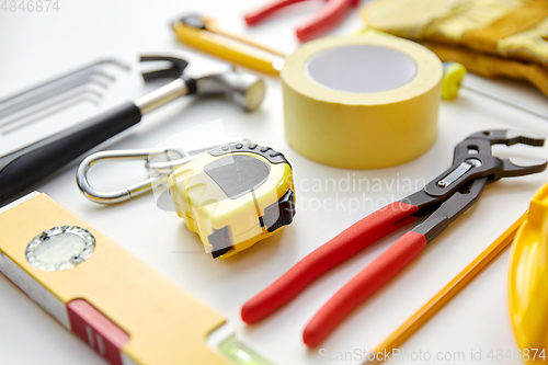 Image of different work tools on white background