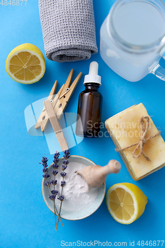 Image of washing soda, soap, towel, dropper and clothespins