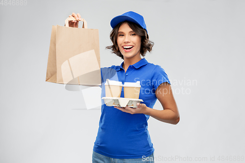 Image of delivery woman with takeaway food and drinks