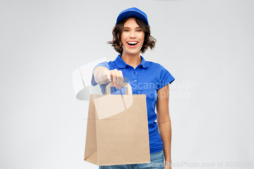 Image of delivery woman with takeaway food in paper bag