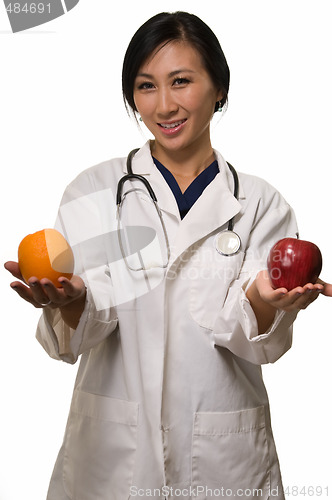 Image of Doctor with apple and orange