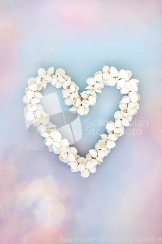 Image of Cockle Sea Shell Heart Wreath on Sky Background