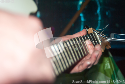 Image of playing the electric guitar 1