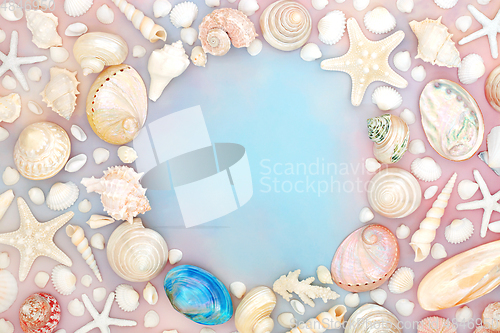 Image of Seashell Border on Rainbow Sky Cloud Background