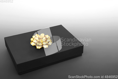 Image of Elegant Black Gift Box with Gold Bow