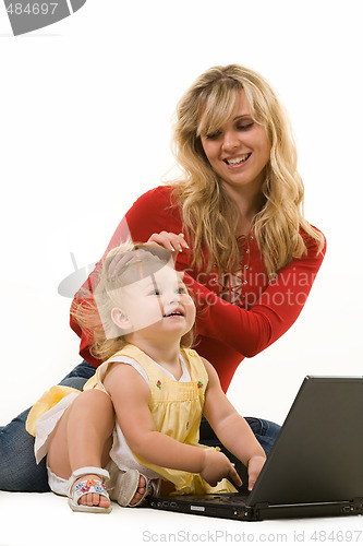 Image of Mom and baby with laptop