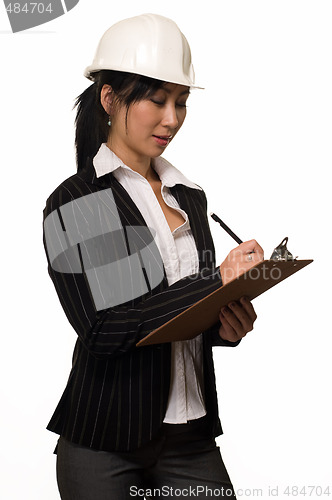 Image of Business woman in hard hat