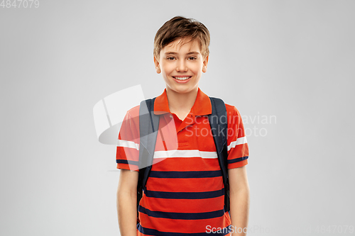 Image of smiling student boy with backpack