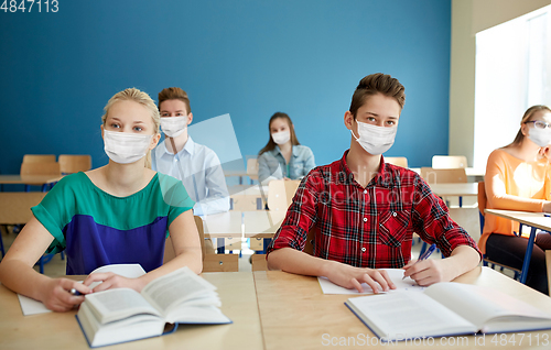 Image of group of students in masks at school lesson