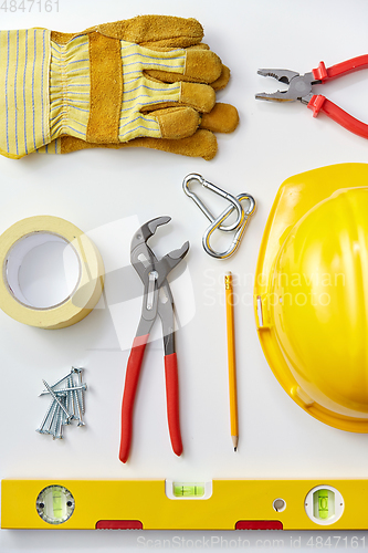 Image of different work tools on white background