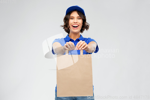 Image of delivery woman with takeaway food in paper bag