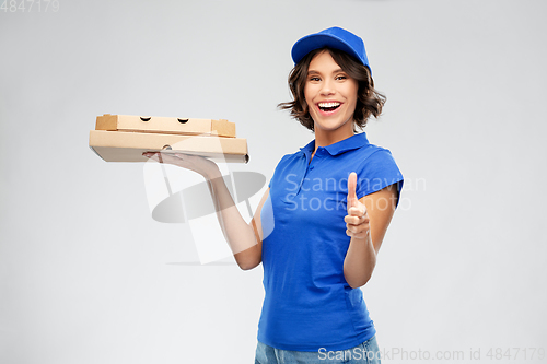 Image of delivery woman with takeaway pizza boxes