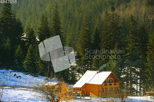Image of Wooden house  Carpathians mountains winter