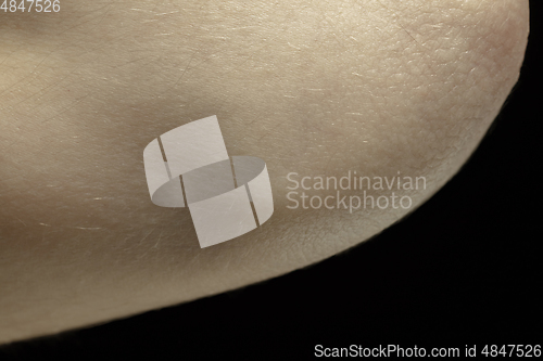 Image of Texture of human skin. Close up of well-kept caucasian human body