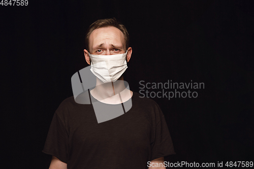 Image of Man in protective mask, coronavirus prevention, protection concept