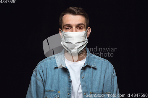 Image of Man in protective mask, coronavirus prevention, protection concept