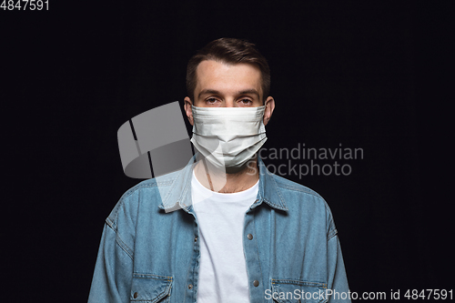 Image of Man in protective mask, coronavirus prevention, protection concept