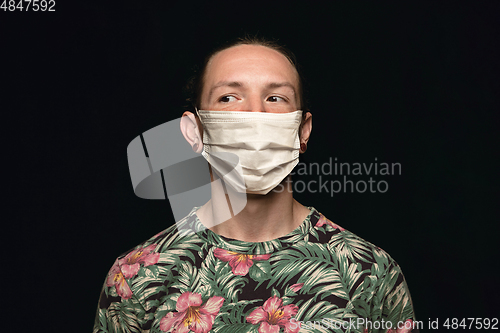Image of Man in protective mask, coronavirus prevention, protection concept