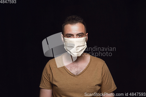 Image of Man in protective mask, coronavirus prevention, protection concept