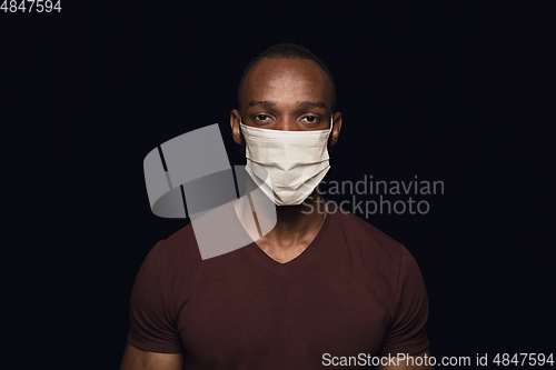 Image of Man in protective mask, coronavirus prevention, protection concept