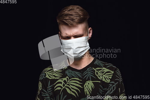 Image of Man in protective mask, coronavirus prevention, protection concept