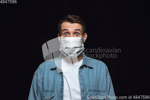 Image of Man in protective mask, coronavirus prevention, protection concept