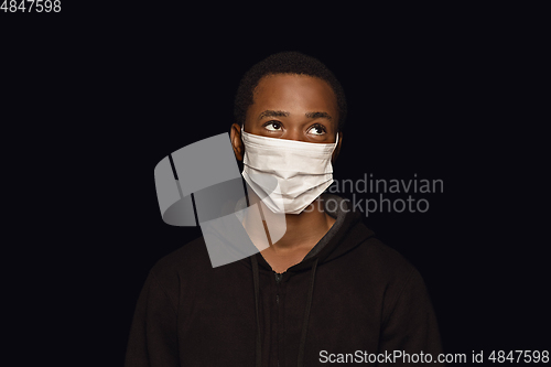 Image of Man in protective mask, coronavirus prevention, protection concept