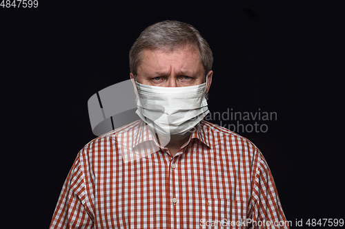 Image of Man in protective mask, coronavirus prevention, protection concept