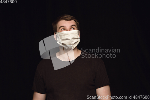 Image of Man in protective mask, coronavirus prevention, protection concept