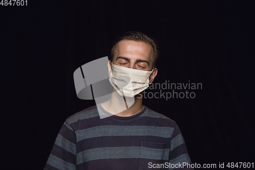 Image of Man in protective mask, coronavirus prevention, protection concept