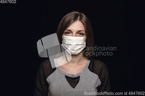 Image of Woman in protective mask, coronavirus prevention, protection concept