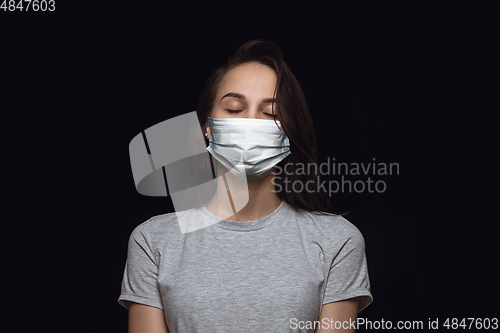 Image of Woman in protective mask, coronavirus prevention, protection concept