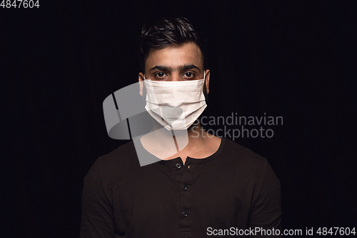 Image of Man in protective mask, coronavirus prevention, protection concept