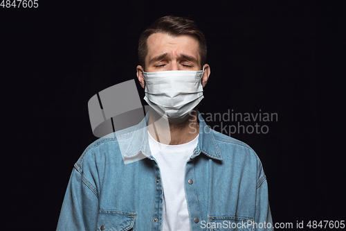 Image of Man in protective mask, coronavirus prevention, protection concept