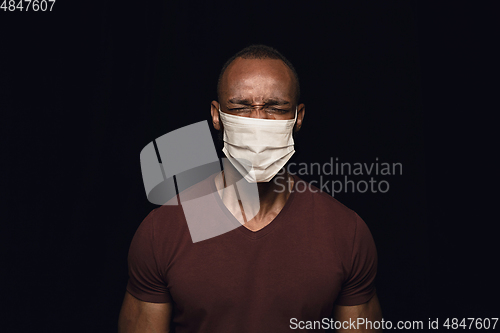 Image of Man in protective mask, coronavirus prevention, protection concept