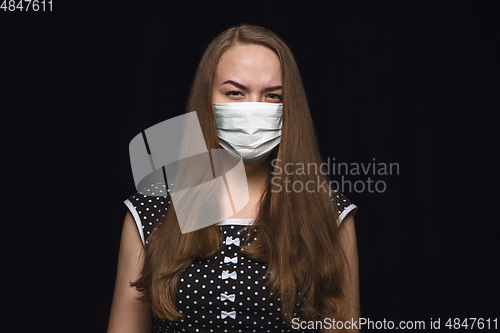 Image of Woman in protective mask, coronavirus prevention, protection concept