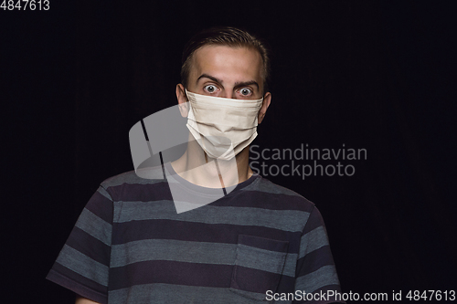 Image of Man in protective mask, coronavirus prevention, protection concept