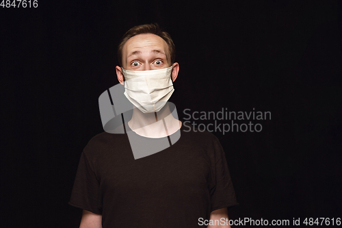 Image of Man in protective mask, coronavirus prevention, protection concept