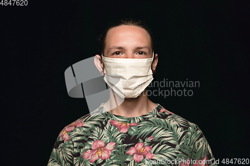 Image of Man in protective mask, coronavirus prevention, protection concept