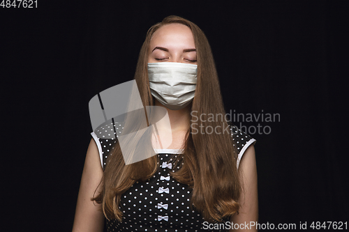 Image of Woman in protective mask, coronavirus prevention, protection concept