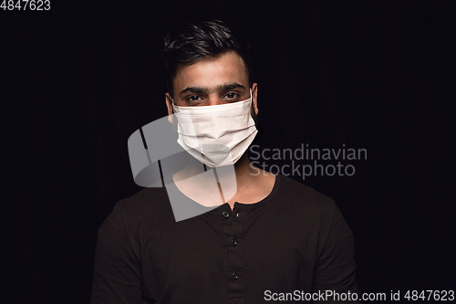 Image of Man in protective mask, coronavirus prevention, protection concept