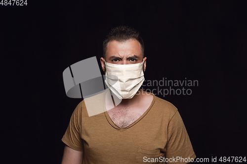 Image of Man in protective mask, coronavirus prevention, protection concept